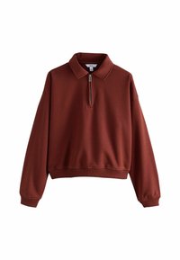 Pullover-sweatshirt in roestkleur met een kraag en een halve rits. Heeft lange mouwen en een cropped zoom. Gladde textuur en geribbelde manchetten.
