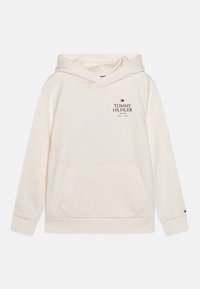 Felpa con cappuccio beige chiaro realizzata in tessuto morbido. Presenta una tasca frontale, stampa del logo e polsini a coste. Design semplice e vestibilità comoda.