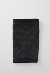 Svart kompresjonsbånd med teksturert design. Har geometriske mønstre og en tett passform. Laget av elastisk, pustende stoff.