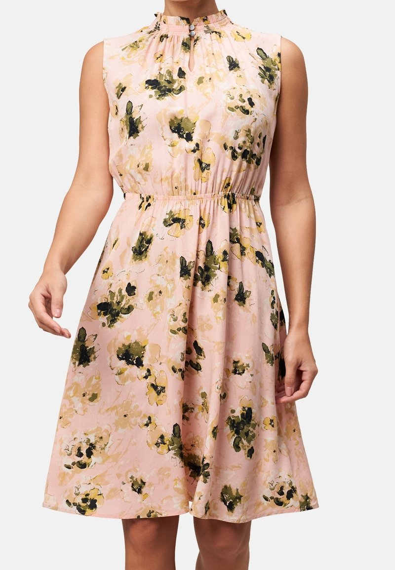 Blumenkleid in Pink mit grünen und gelben Mustern. Hat einen gerafften Ausschnitt, ärmelloses Design und einen elastischen Bund für eine entspannte Passform.