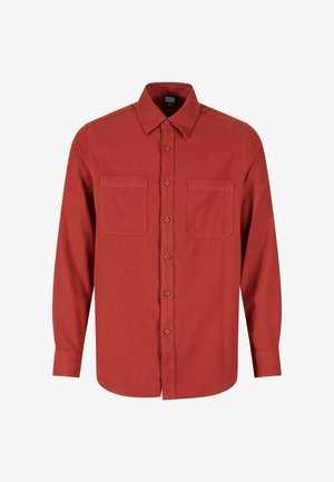 Chemise rouge à manches longues en tissu de coton, dotée d'un col, d'une fermeture à boutons sur le devant et de deux poches poitrine avec une texture unie.