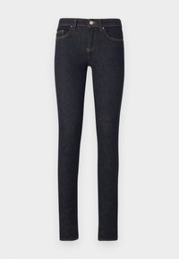 Jeans skinny de denim azul oscuro, con cierre de botón frontal, cinco bolsillos y costuras en contraste color naranja.