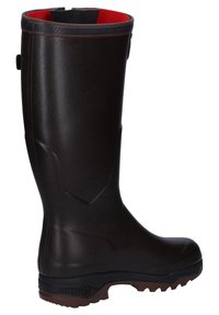 Brown rubber knee-high boot with textured surface, red interior, and black top trim; features a rugged sole for traction.