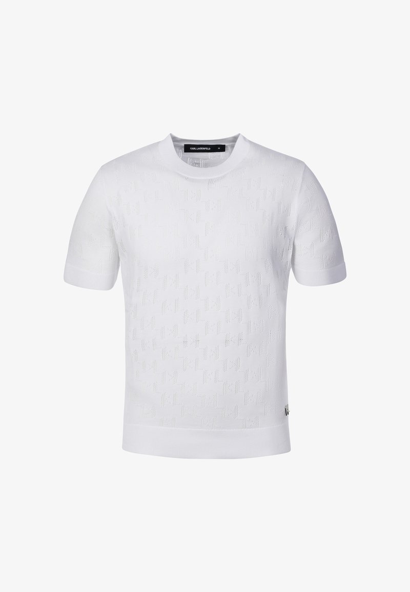 Pull en tricot blanc à manches courtes avec un motif texturé subtil et des poignets, un col et un ourlet côtelés, étiquette Karl Lagerfeld taille M.