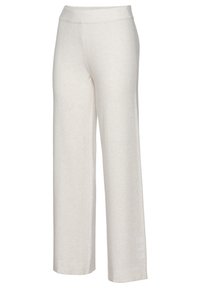 Beige weit geschnittene Hosen aus weichem Stoff mit glatter Textur, mit elastischem Bund und einem dezenten Logo auf der Seite bedruckt.