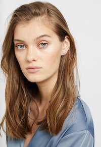 Swarovski SUNSHINE - Ohrringe - white