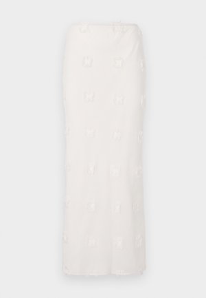 Biela sukňa po kolená vyrobená z textúrovanej tkaniny, s vyšívaným vzorom a jemným strapcováním. Priamy strih a bezšvový pás.