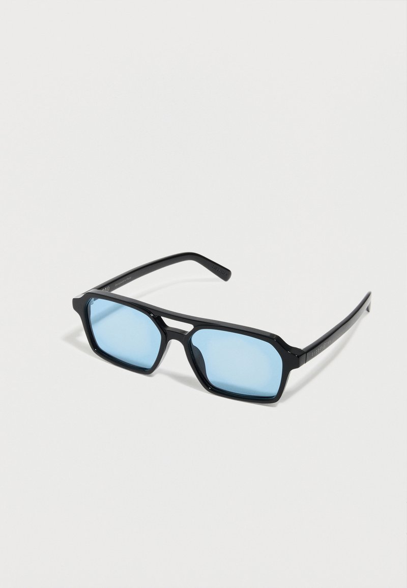 Black rectangular sunglasses with light blue lenses resting on a white surface, showing front and side arms.