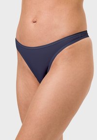 Navy blue bikini bottom made of smooth, thin material with a low-rise design and minimal coverage, featuring a clean elastic waistband.