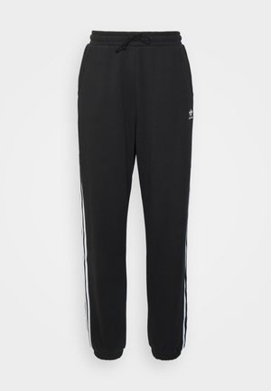 Zwarte sweatpants van katoen, met een trekkoord in de taille, zijzakken en contrasterende witte strepen langs de buitennaad.
