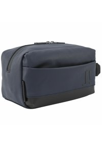Borsa da toeletta rettangolare blu navy realizzata in tessuto resistente, con superficie liscia, cuciture visibili e un accento nero alla base.