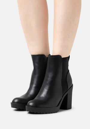 High heeled ankle boots - black