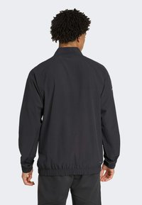adidas Performance Veste coupe-vent - black