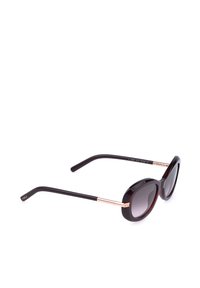 Lunettes de soleil noires et or rose avec verres ronds dégradés et fines branches, présentées en vue latérale sur fond blanc.