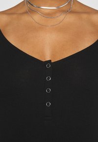 Even&Odd Tubino - black