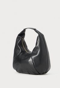 Black leather bag with a curved, soft shape, zipper closure, and a single handle. Smooth texture with minimal seams.