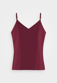 Camisole bordeaux sans manches avec fines bretelles ajustables et encolure en V sur fond blanc.