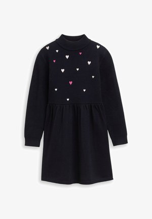 Robe en tricot marine avec un col roulé, présentant une jupe froncée et des cœurs éparpillés en broderie rose et blanche sur le buste.