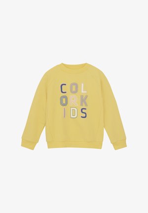 Geel sweatshirt met de tekst "COLOR KIDS" in diverse kleuren. Gemaakt van zachte stof, met raglanmouwen en ribbelboord aan de hals en manchetten.