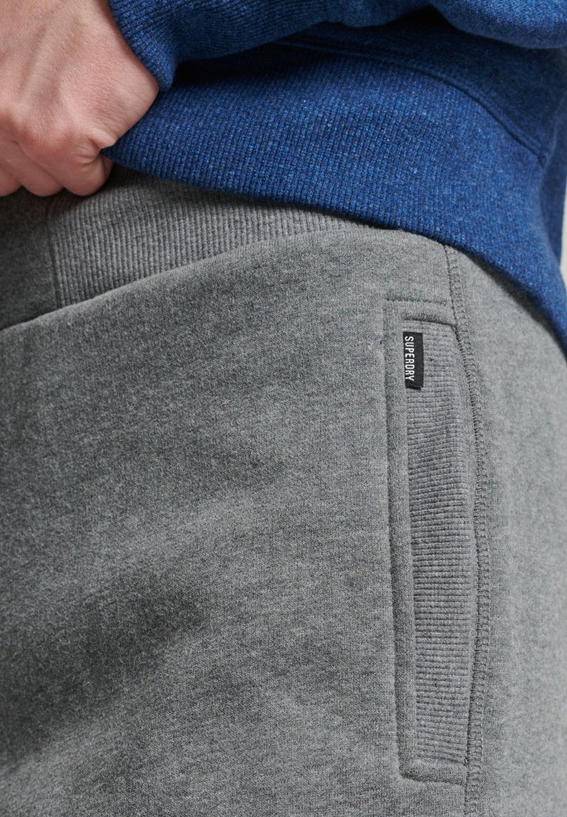Herren Trainingsanzüge | Superdry Jogginghose rich charcoal marl/grau - FJ79215 Herren Trainingsanzüge | Superdry Jogginghose rich charcoal marl/grau - FJ79215