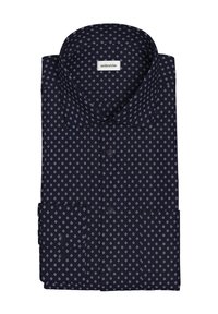 Chemise bleu marine à boutons, ornée de petits motifs géométriques, à manches longues, avec un col rabattu et une poche gauche assortie.