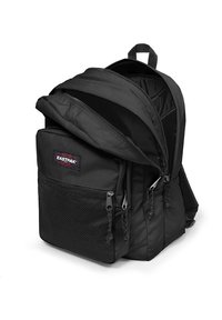 Sac à dos Eastpak noir en tissu durable, avec une poche zippée extérieure, un panneau en mesh et deux bretelles réglables. Compartiment principal ouvert.