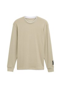Langärmliges Hemd in hellem Beige mit einem strukturierten Karomuster, runder Halsauschnitt und schwarzem Etikettakzent am linken Ärmel.