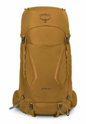 Grand sac à dos de randonnée Osprey Kyte 48 jaune moutarde avec plusieurs sangles, boucles et une ceinture ventrale rembourrée.