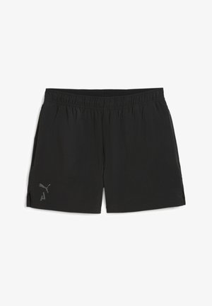 Juodi sportiniai šortai su elastinga juosta, šoninėmis plyšiais ir pilku atspindinčiu logotipu apatinėje kairėje pusėje. Lengva medžiaga.