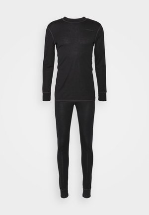 Schwarzes Thermaloberteil und -unterteil, hergestellt aus einem weichen, dehnbaren Stoff. Mit langen Ärmeln und passgenauer Beinform, mit kontrastierenden Nähten.