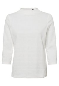 Top bianco, con texture, maniche a tre quarti e collo alto, dalla vestibilità leggermente ampia. Presenta un delicato motivo a griglia, senza chiusure visibili.