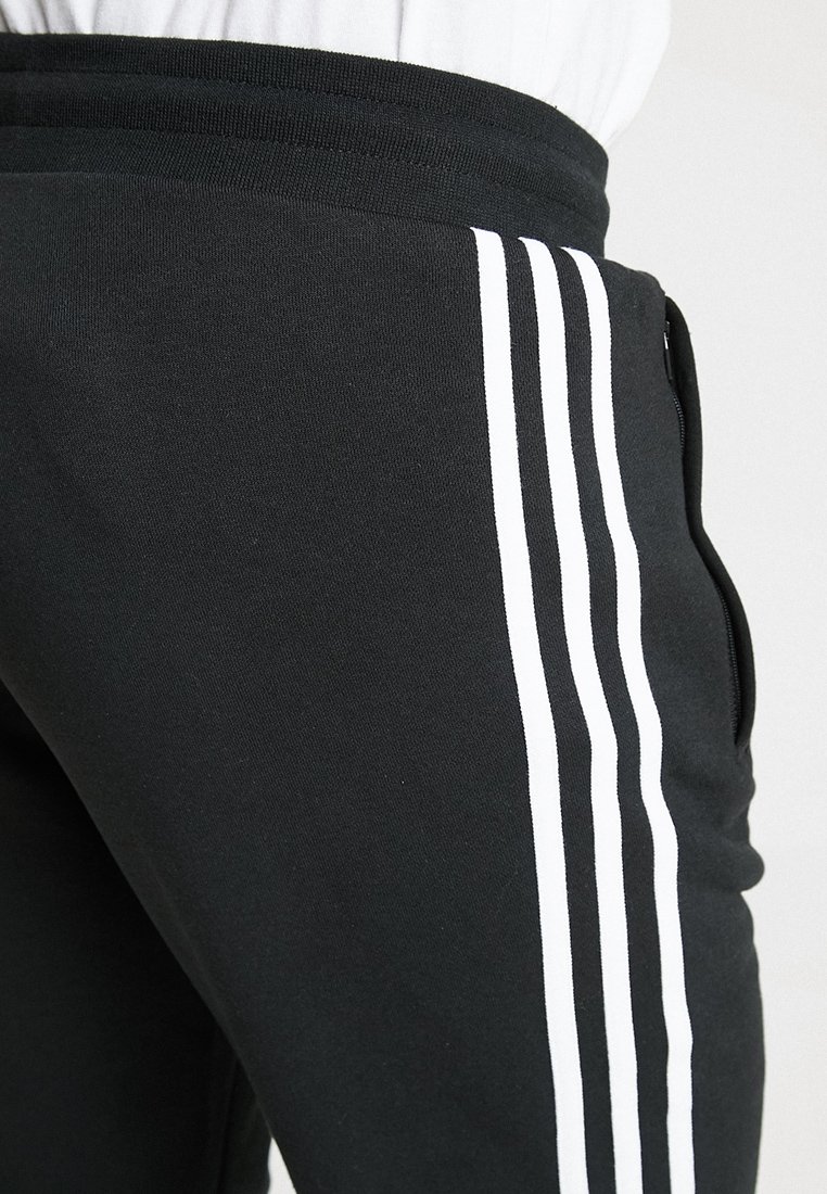 adidas Adicolor Classics 3-Stripes 7/8 Pants - Blue | adidas Deutschland