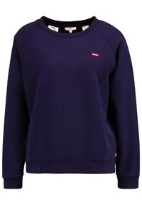 Tmavě modrá mikina z materiálu s bavlněnou směsí, s kulatým výstřihem, dlouhými raglánovými rukávy a malým červeným logem na hrudi.