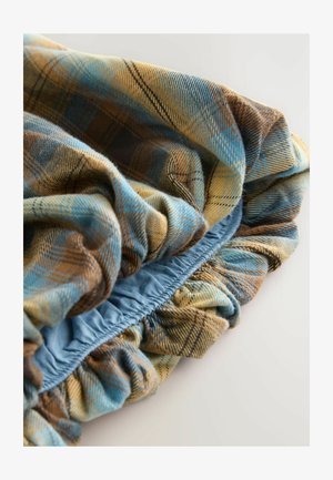 Tessuto a quadri con tonalità blu, marrone e gialla; dettaglio con vita elasticizzata arricciata; morbido tessuto testurizzato con bordo arricciato.