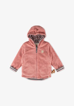 Pink fuzzy hooded jacket with zip closure, striped inner lining, elastic cuffs with blue and white stripes, and a decorative patch on the chest.