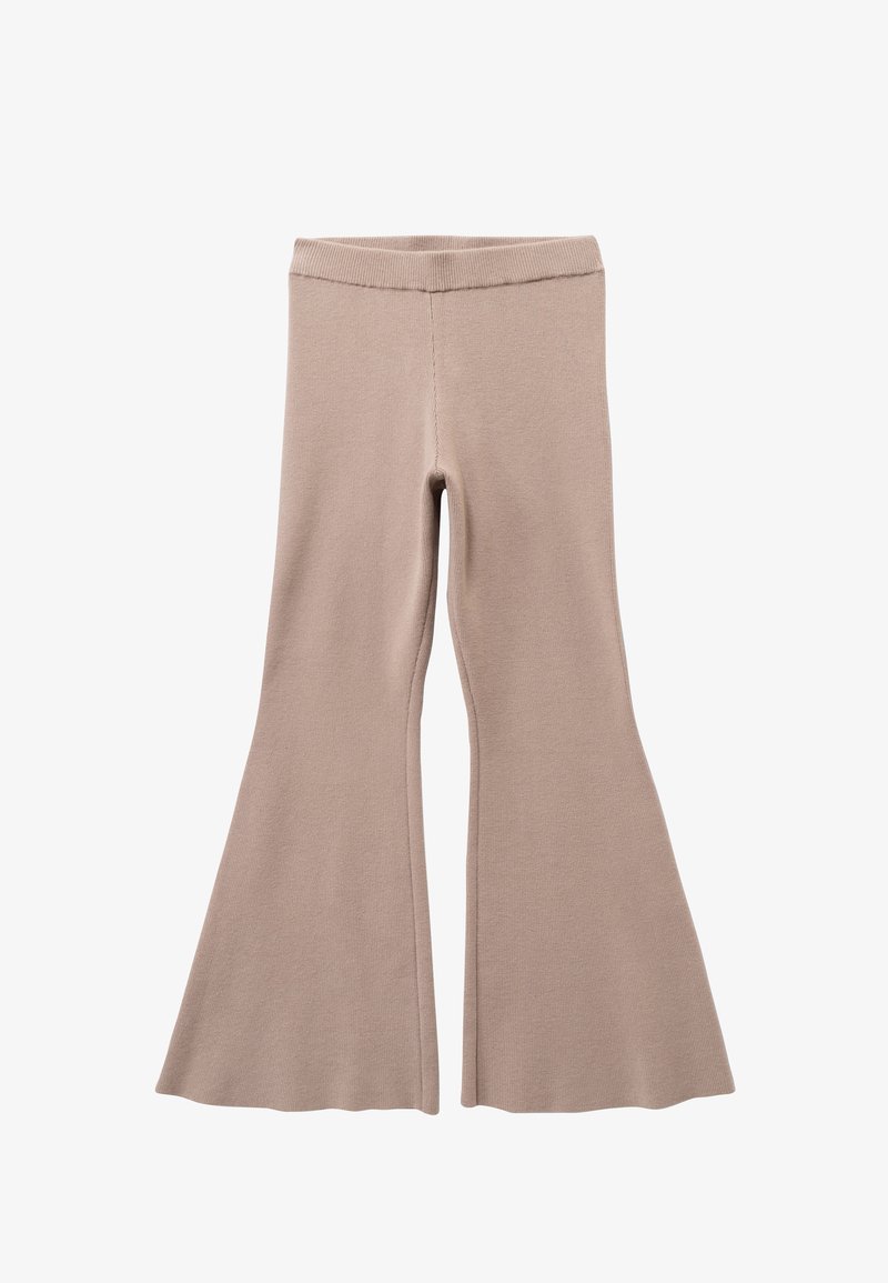 Beige flared leggings van zacht gebreid materiaal. Heeft een aansluitende taille en een brede flare aan de onderkant. Gladde textuur met minimale stiksels.