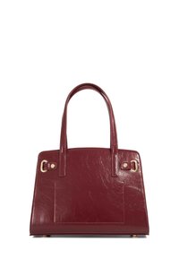 Burgundy leather handbag with a structured design, two handles, gold hardware accents, and a smooth texture. Features a front pocket.