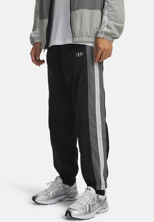 UA ICON JOGGER - Tepláky - black