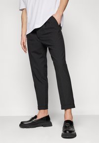 AllSaints DICE TALLIS TROUSER - Hlače - black