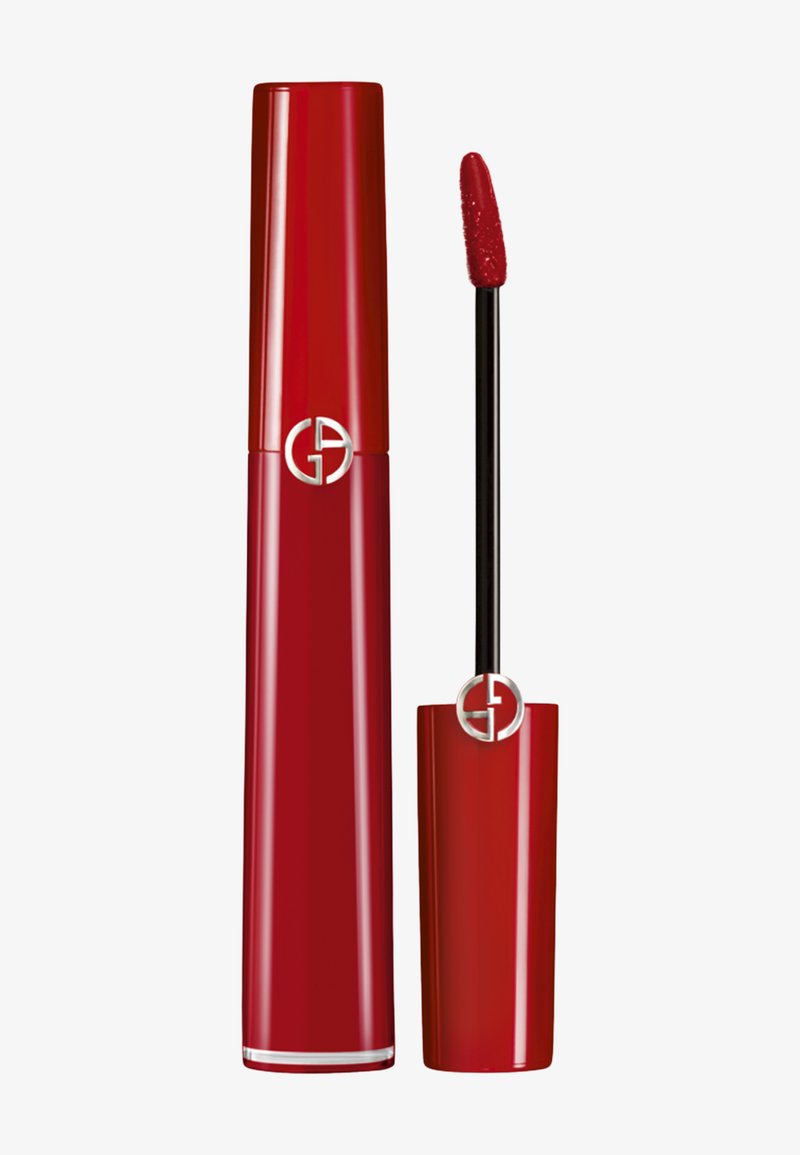 Rouge à lèvres liquide dans un tube rouge élégant et brillant. Doté d'un applicateur noir avec une pointe en forme d'œuf. Logo affiché sur le capuchon.