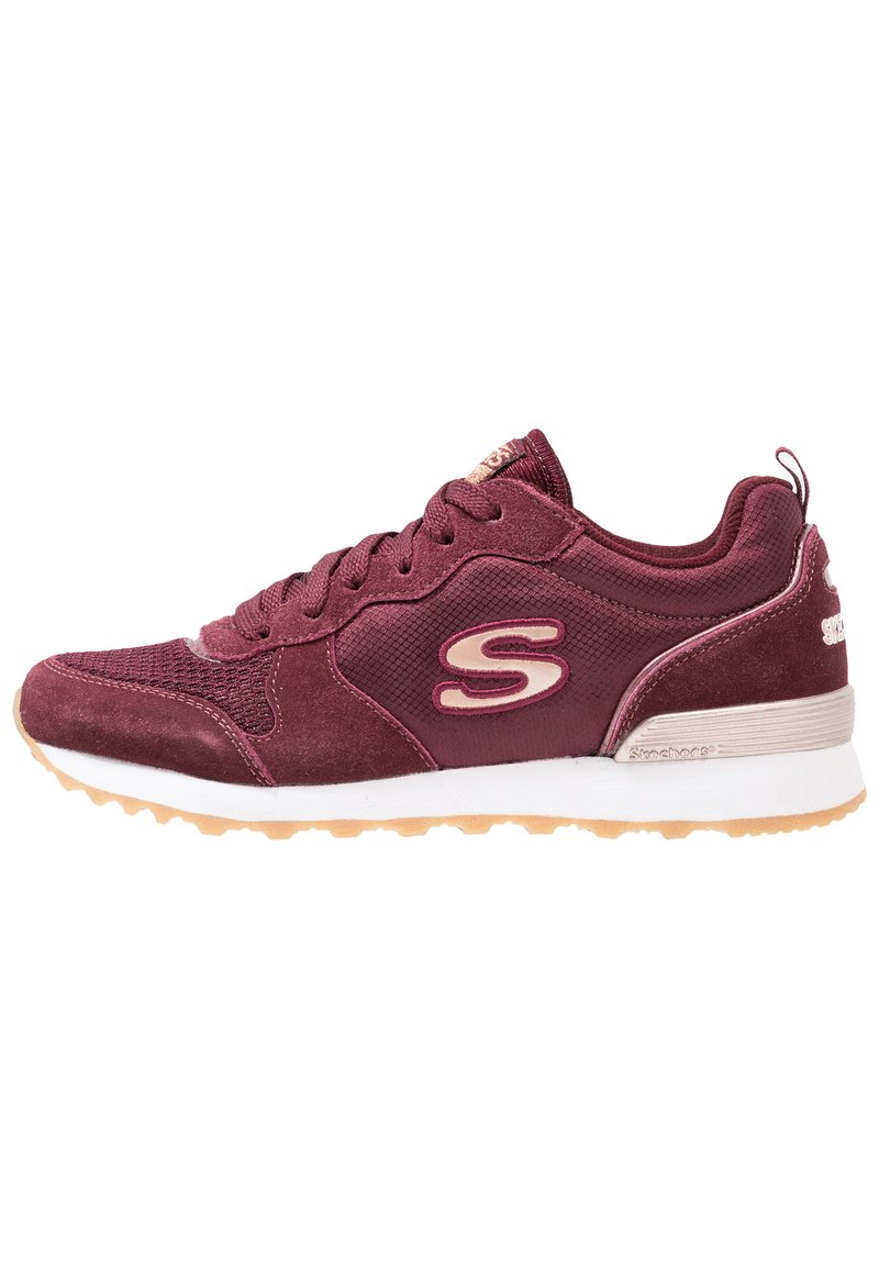 Burgundy athletic shoe with a mix of mesh and suede materials, round toe, textured surfaces, and a rubber sole with a light gum color.
