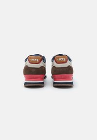 Brown and navy suede and mesh sneakers with white accents, featuring a cushioned sole, "1973" logo, and "PEPE JEANS" embossed detail.
