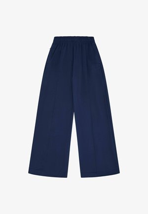 Marinefarbene, weit geschnittene Hosen aus weichem Material, mit elastischem Bund und Seitentaschen, die über saubere Nähte und ein minimalistisches Design verfügen.