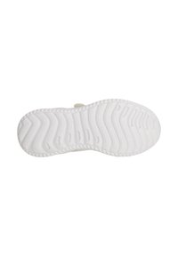 Vit gummisula till sneakers med texturerad mönster. Rundad form med spår och kanter för grepp. Minimal design, ingen synlig märkning.