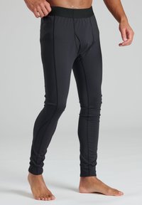 Zwarte sportleggings met een slim fit, elastische tailleband en flatlock-naden. Gemaakt van een gladde, rekbare stof voor comfort en bewegingsvrijheid.