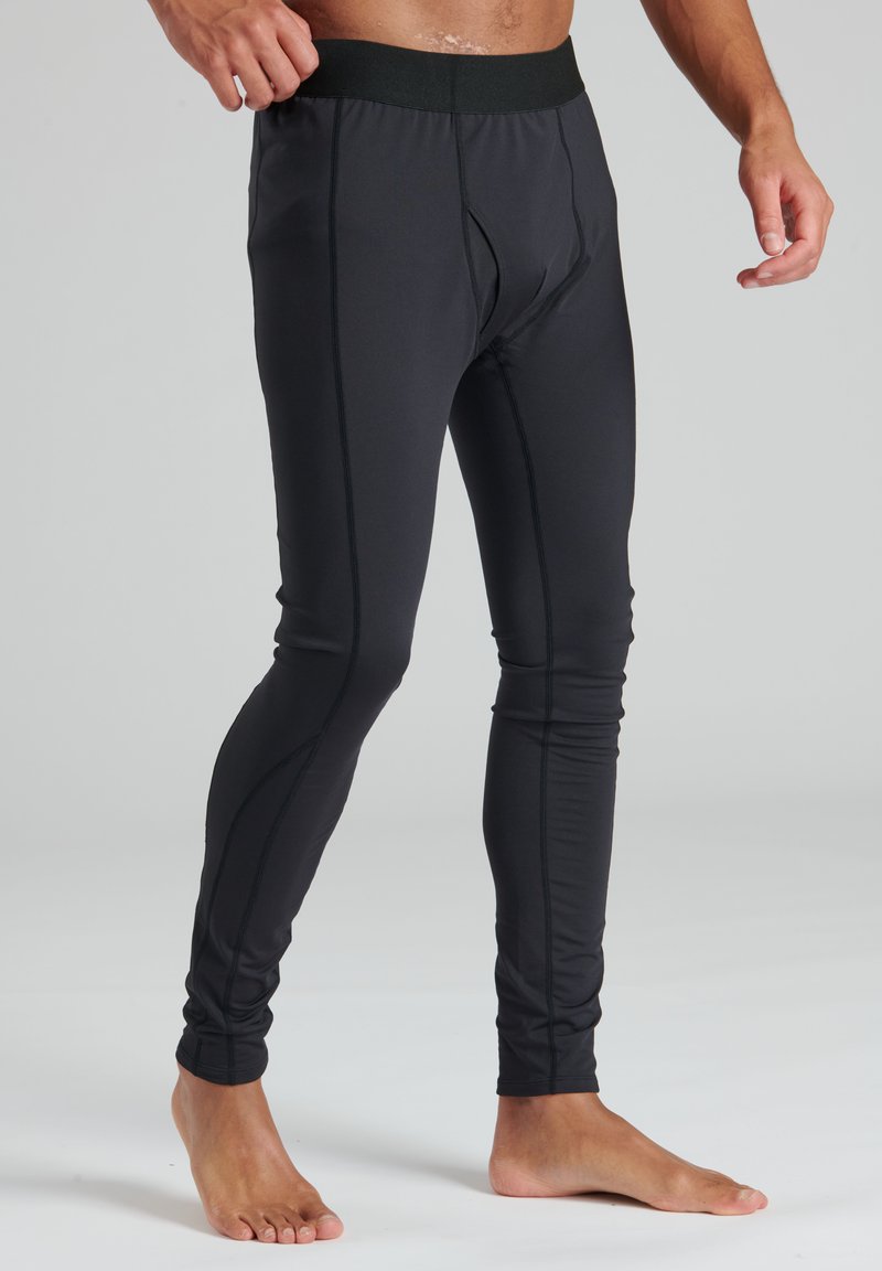 Zwarte sportleggings met een slim fit, elastische tailleband en flatlock-naden. Gemaakt van een gladde, rekbare stof voor comfort en bewegingsvrijheid.