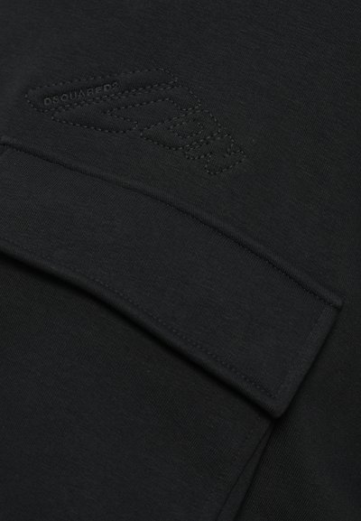 Black cotton fabric with a stitched DSQUARED2 logo. Features a folded design with visible seam details and a smooth texture.
