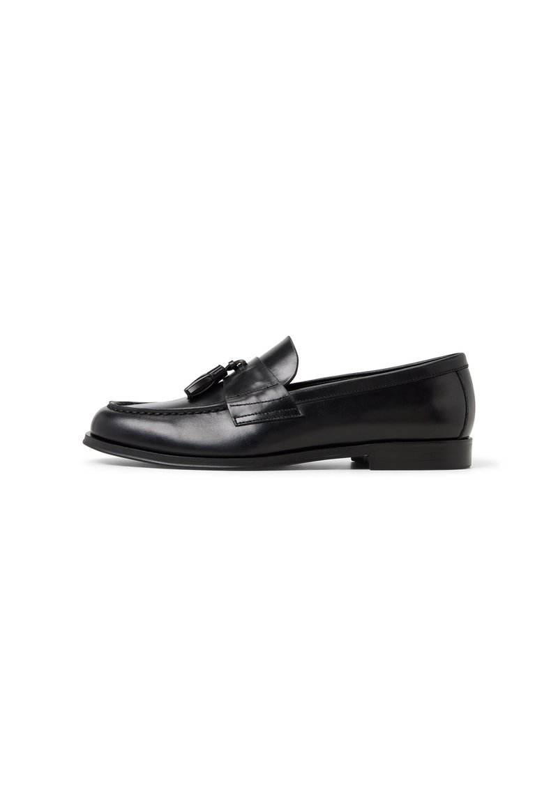 Schwarze Lederloafer mit runder Zehenform, dekorativen Quasten, subtiler Naht und niedrigem Blockabsatz. Glatte Textur mit geschmeidigem Finish.