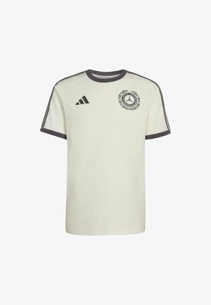 Lichtcrèmekleurig T-shirt met korte mouwen, contrasterende donkergrijze geribbelde kraag en mouwranden, met een zwart geborduurd logo en drie strepen.