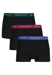 Tre par med svarte boxershorts. Hver av dem har en forskjellig farget midjebånd: grønn, burgunder og blå, med "GANT"-logo trykt.